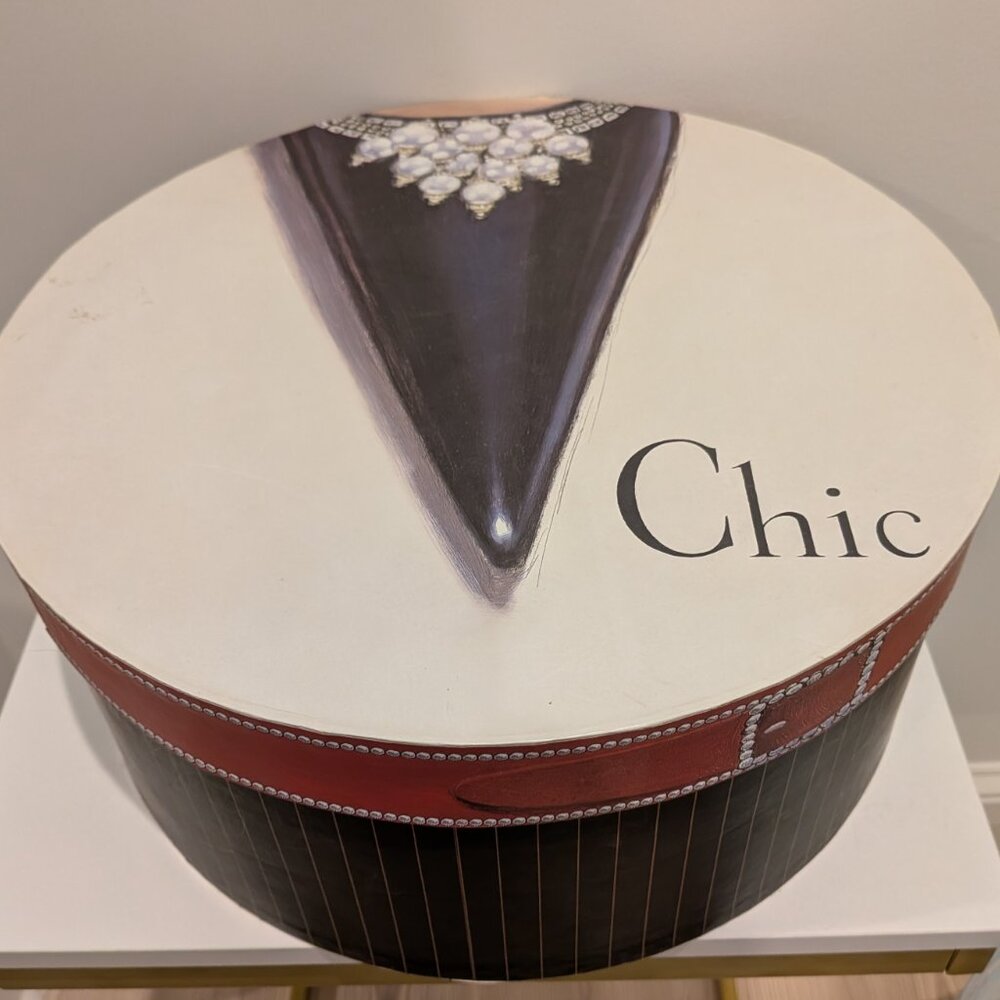 Decorative hat box, very large. Missing the carry cord.